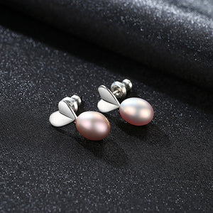 Orecchini pendenti di perle